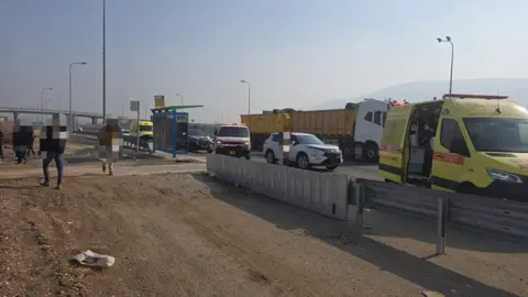 Ambulance and emergency vehicles at the scene of an attack in northern Israel, 26 December 2025
