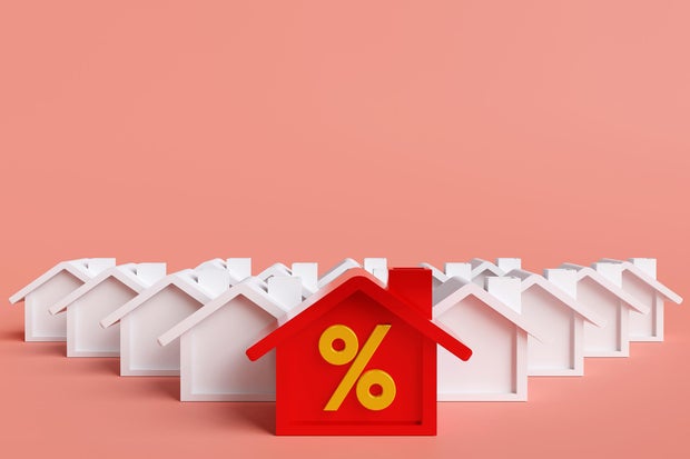 Illustration of a house, documents, and interest rate symbols representing mortgage refinancing and changing rates.