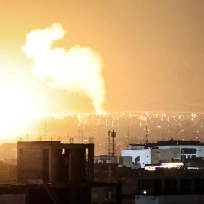 Smoke and fire rise from the site of airstrikes in a central area of the Iranian capital Tehran, March 6, 2026. - ATTA KENARE/AFP/Getty