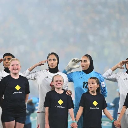 Islamic Republic of Iran players line up for national anthems prior to the AFC Women's Asian Cup Australia 2026 match between Iran and Australia Matildas, at Gold Coast Stadium, March 5, 2026, in Gold Coast, Australia. - Albert Perez/Getty