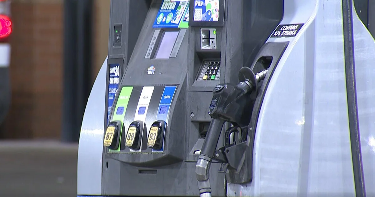 Close-up of gas pump nozzles, reflecting higher fuel prices feeding into inflation risks.