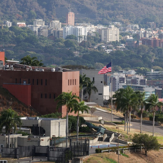 Left: The U.S. flag flies at the former U.S. embassy now housing the Venezuela Affairs Unit (VAU), as the United States and interim authorities in Venezuela agreed to re-establish diplomatic and consular relations, following Nicolas Maduro's capture, in Caracas, Venezuela March 14, 2026. File photo by Leonardo Fernandez Viloria/Reuters - File photo by Leonardo Fernandez Viloria/Reuters