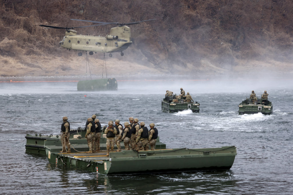 U.S. and South Korean troops conduct a river-crossing drill during the Freedom Shield exercises near the DMZ in Yeoncheon, South Korea, March 14, 2026.