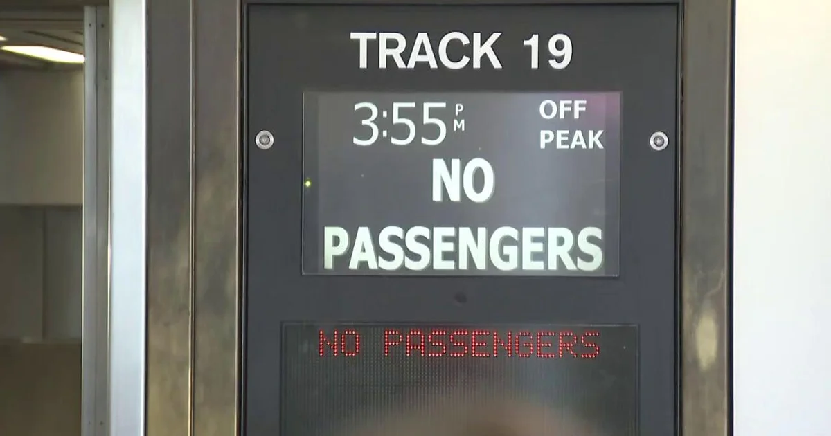 Station information display reading 'NO PASSENGERS' at an LIRR platform