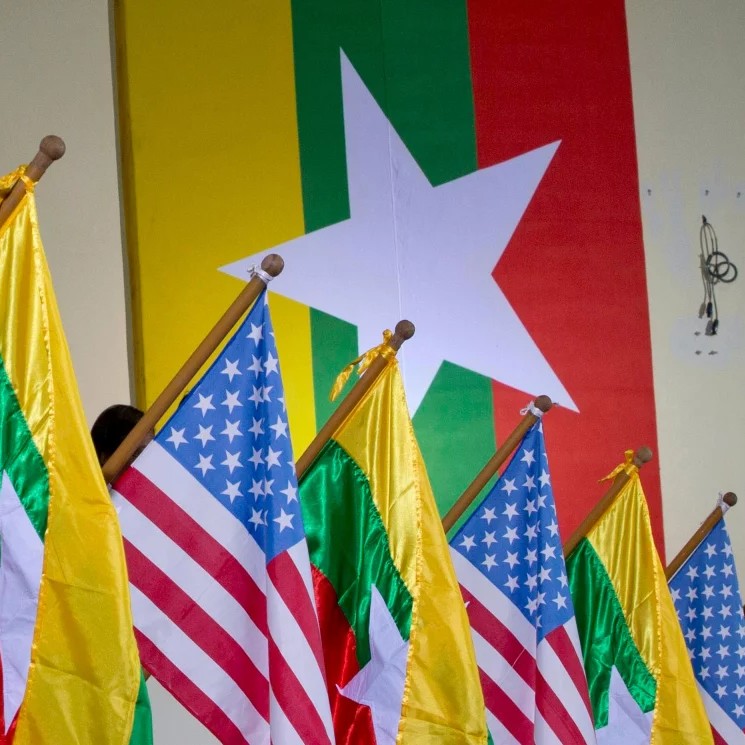 FILE - U.S. and Myanmar national flags are decorated at University of Yangon's convocation hall in Yangon, Myanmar, Nov. 19, 2012. - Gemunu Amarasinghe/AP