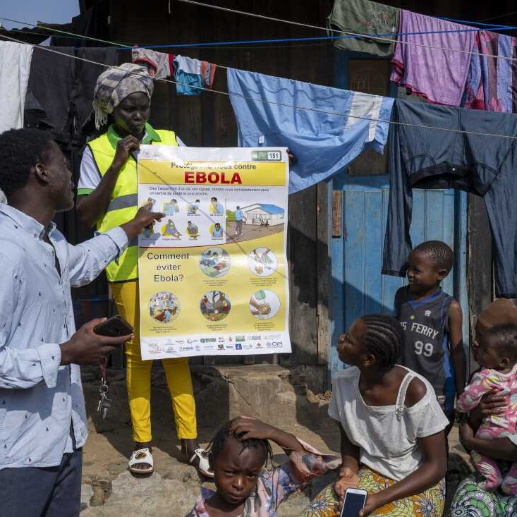 Eliezer Kasongo, president of REMEDE Bunia, raises awareness among residents about Ebola prevention measures during a community outreach event on Ebola Awareness Day in Bunia, Ituri Province, Democratic Republic of the Congo. - Arsene Mpiana Monkwe for NPR